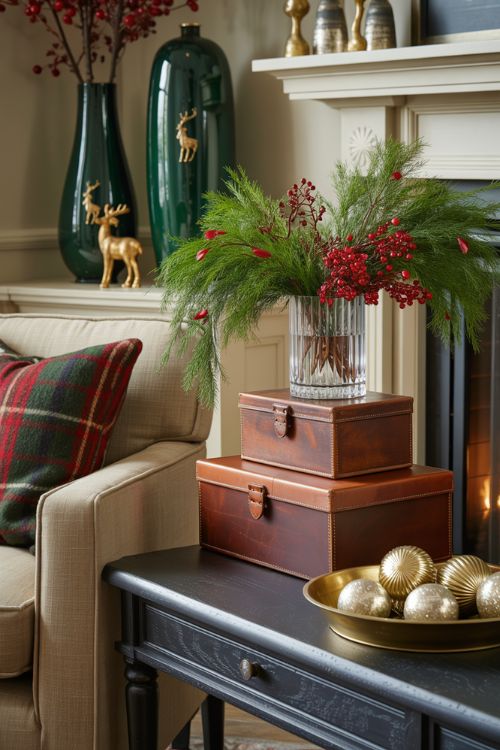 Ralph Lauren holiday home accessories including leather trinket boxes, crystal vases, decorative trays, and elegant festive decor on shelves and tables.