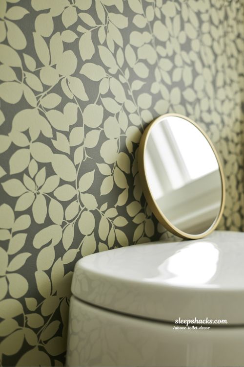 Bold Floral Peel and Stick Wallpaper Accent Above Bathroom Toilet