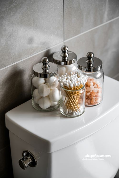 Create a Spa Vibe with Simple Glass Jar Toilet Tank Decor