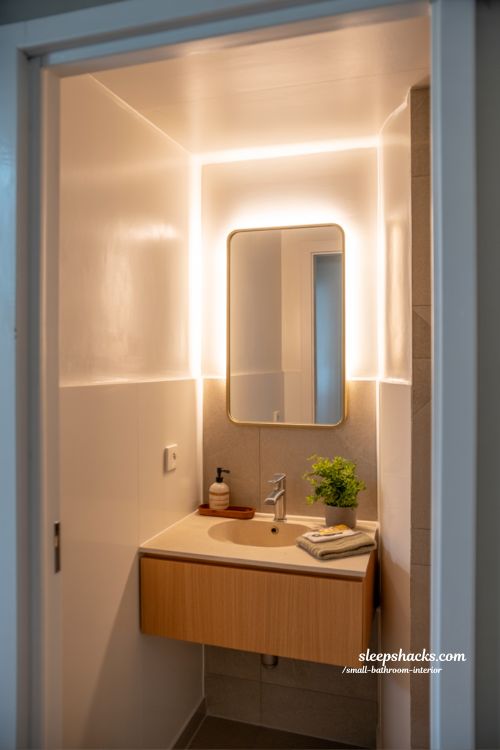 Floating fixtures modern small bathroom interior wall mounted sink toilet floating vanity minimalist Japandi design airy space illusion