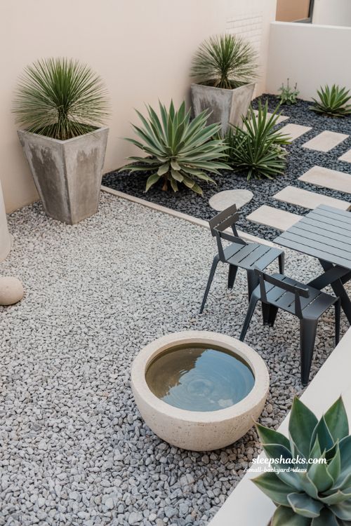 Low maintenance small backyard ideas featuring a gravel patio concrete planters and hardy succulents for a beautiful easy care garden