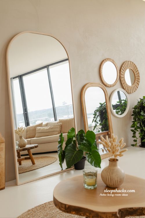 Maximize Light: Bright Boho Living Room Ideas with Large Mirrors and Natural Decor
