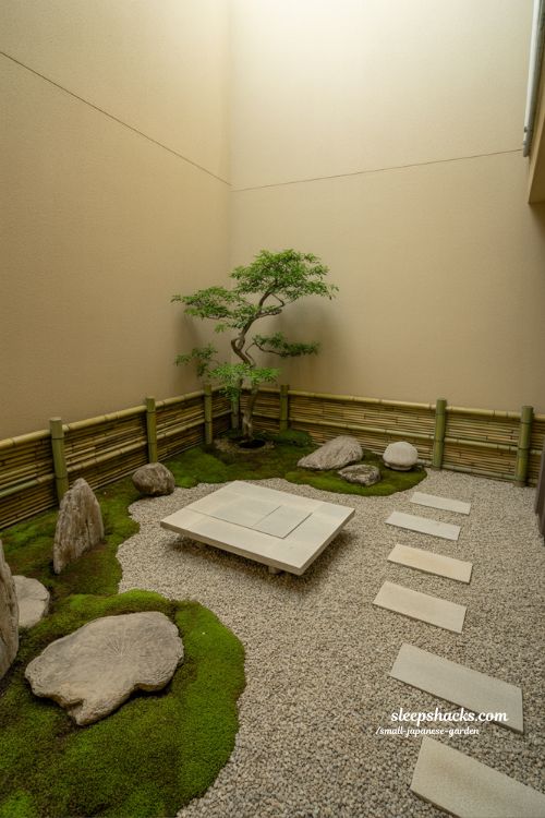 Meditation corner ideas in a small japanese garden setup with stone seat moss gravel and peaceful zen design