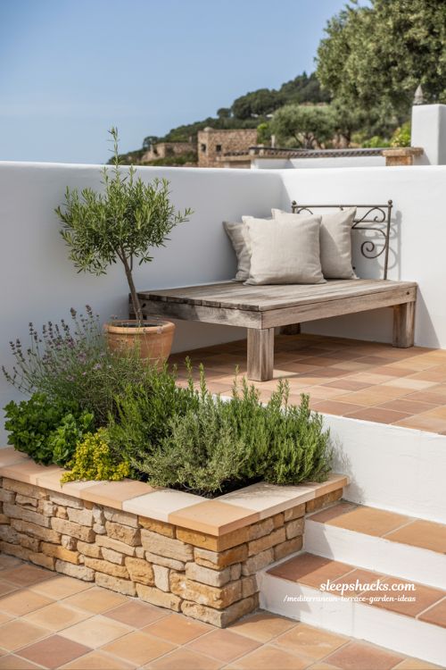 Mediterranean Terrace Design with Subtle Raised Wooden Platform and Built-in Planters
