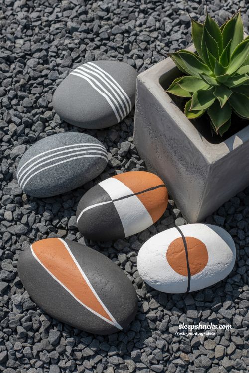 Modern Abstract Rock Painting Ideas for a Clean and Stylish Garden Look