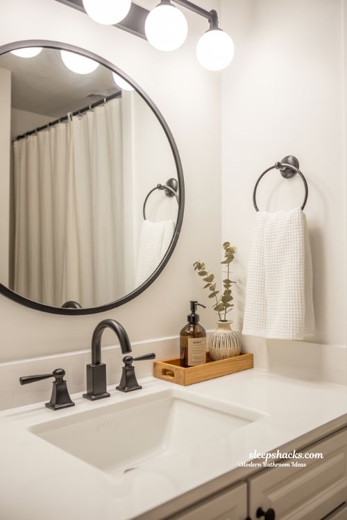 Modern Compact Bathroom with Wall-to-Wall Mirror and Seamless Glass Partition