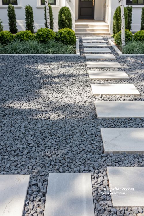 Modern Front Yard Gravel Landscape with Limestone Path and Boxwood Shrubs