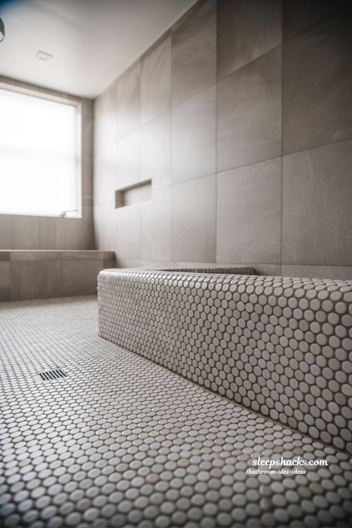 Modern Spa Bathroom Featuring Subtle Penny Tile Shower Floor and Oak Accents