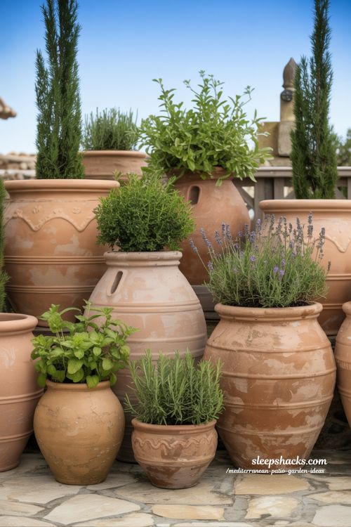 Modular Mediterranean Container Garden with Layered Terracotta Pots and Fragrant Herbs