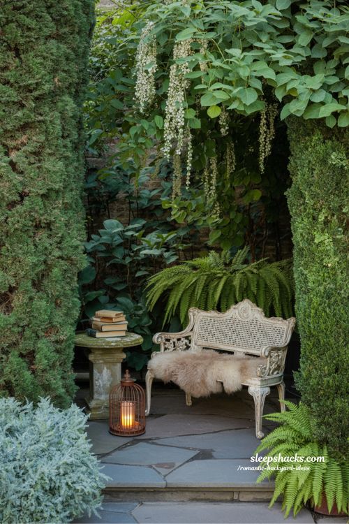 Romantic outdoor dining ideas with reclaimed wood table and flickering candlelight for an intimate dinner party