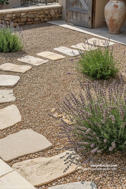 Rustic Mediterranean Gravel Garden with Limestone Pathways and Drought-Tolerant Planting