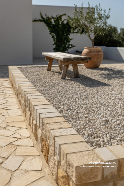 Rustic Mediterranean Gravel Patio Idea with Stone Edging