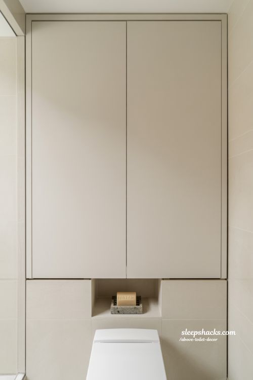 Sleek Handleless Hidden Cabinet Above Toilet for Minimalist Bathroom