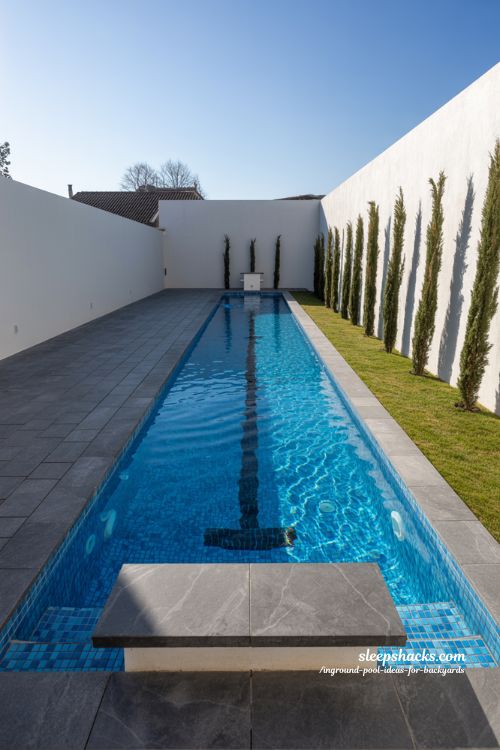 Sleek Modern Lap Pool Design for Fitness and Wellness with Non-Slip Stone Decking