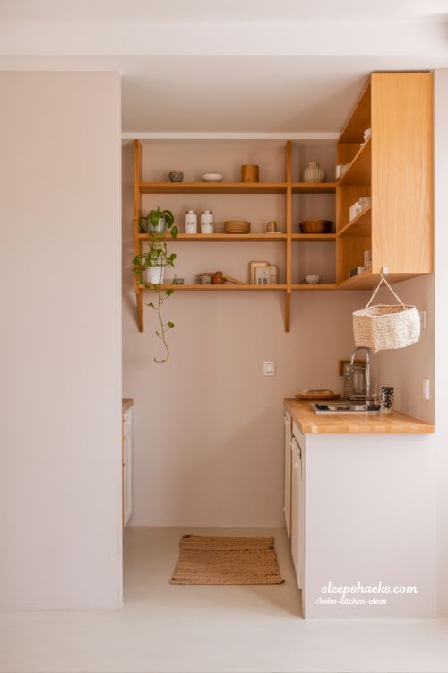 Small Boho Kitchen Design with Light Wood Shelves and Airy Decor