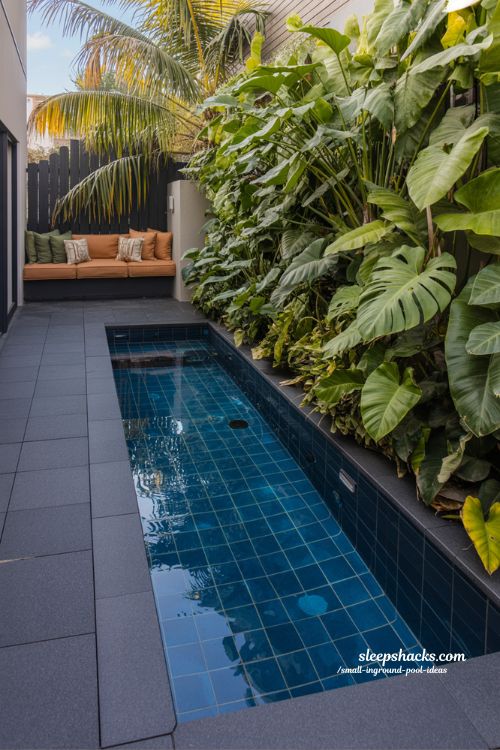 Small Inground Pool with Integrated Sunken Fire Pit and Evening Ambient Lighting