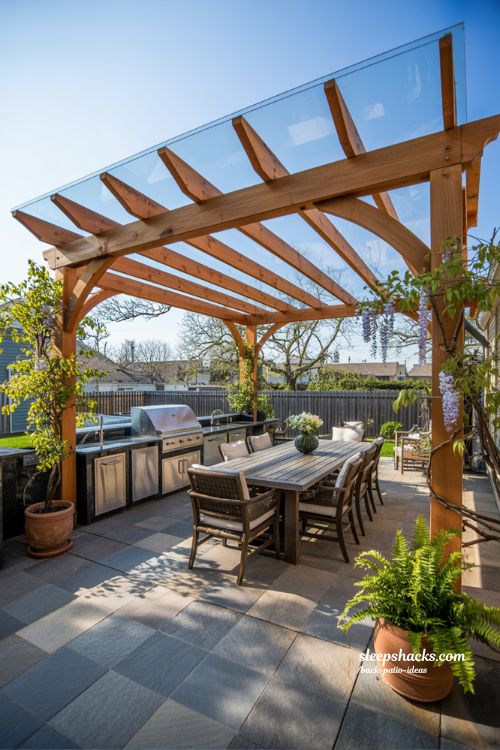 Modern-Rustic Covered Back Patio with Timber Pergola and Outdoor Kitchen
