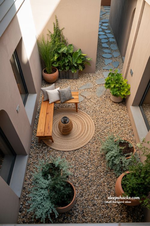 Vertical garden design transforming plain walls with lush planters and climbing plants in a charming small backyard nook.
