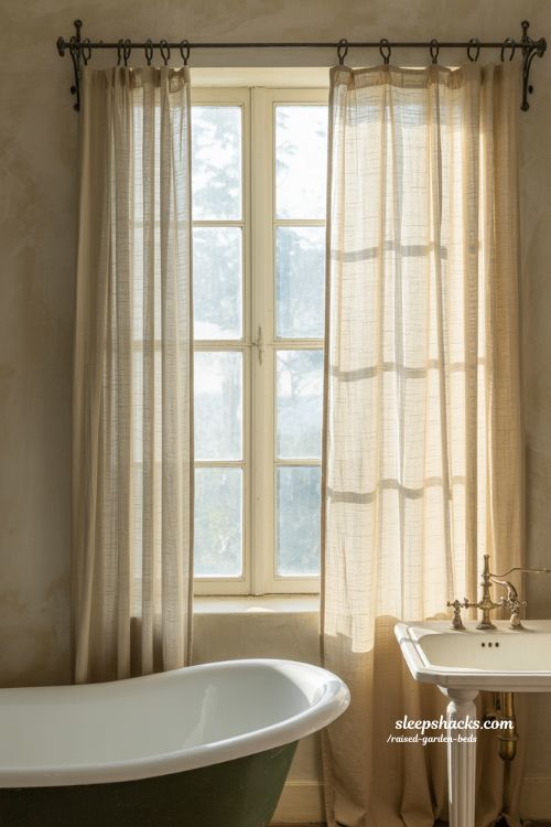 Vintage bathroom decor with soft white linen curtains and natural sunlight in sharp focus