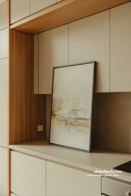 art above cabinet decor ideas for modern kitchens with large framed artwork and minimal gallery style clean interior design