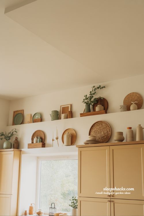 curated above cabinet decor vignette ideas with mixed materials and cozy modern farmhouse storytelling kitchen styling