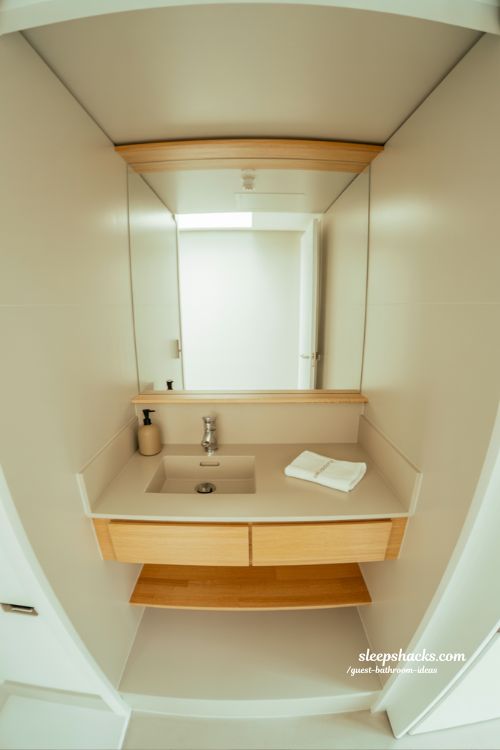 minimalist guest bathroom ideas for clean simple style with modern uncluttered design and soft neutral tones