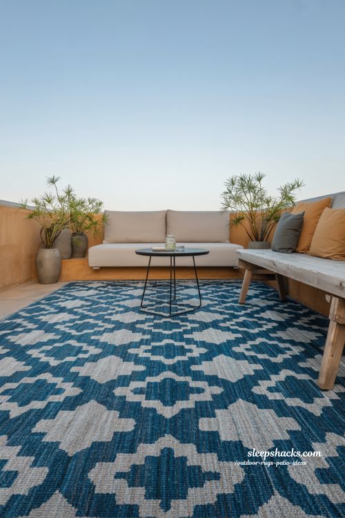 outdoor rugs patio ideas bold patterned rug on minimalist patio with blue geometric design and modern outdoor styling
