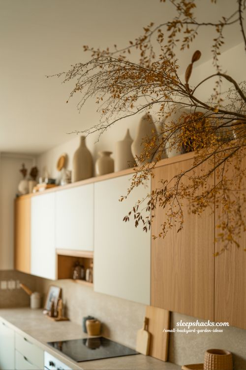 seasonal above cabinet decor ideas for fresh kitchen styling with soft natural accents and year round warm modern farmhouse feel