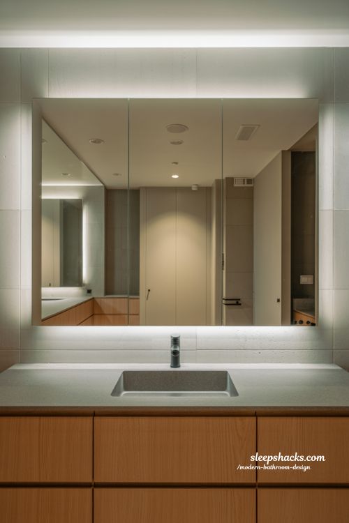 smart mirror ideas in modern bathroom design with large backlit mirror and minimalist floating vanity interior