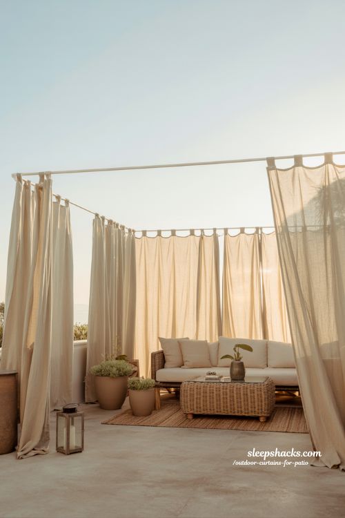soft outdoor living patio with flowing curtains and cozy minimal boho design ideas