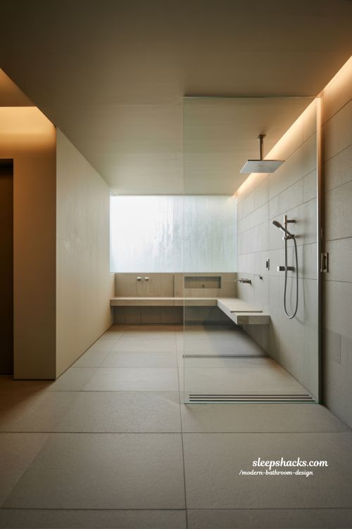 wet room modern bathroom design with frameless glass and seamless open spa style layout for small spacious interiors