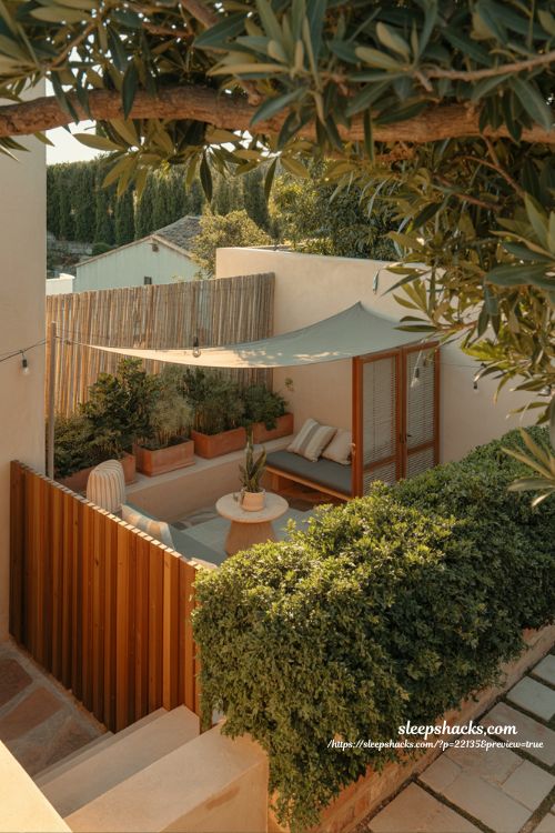 Backyard privacy ideas with fencing hedges and shade sails for secluded garden retreat