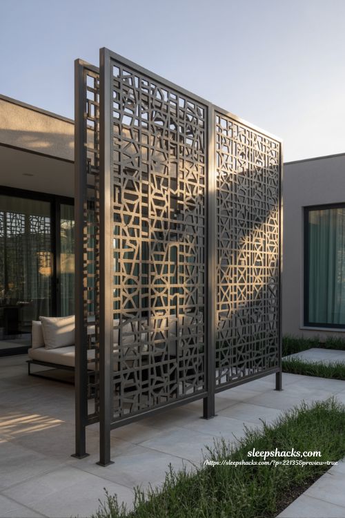Backyard privacy ideas with modern geometric laser cut screen for contemporary outdoor design