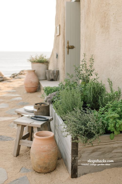 Coastal cottage garden herb corner ideas with raised beds and soft natural textures