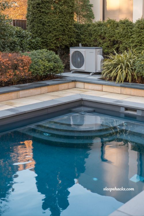 Heated fiberglass pool with heat pump system modern backyard design for extended swimming season and minimalist outdoor living space