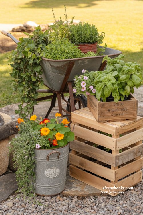 Repurposed garden container ideas with wheelbarrows buckets and wooden crates