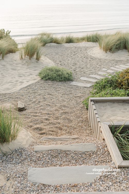 Sand and gravel coastal cottage garden ideas with minimal natural textures and low maintenance design