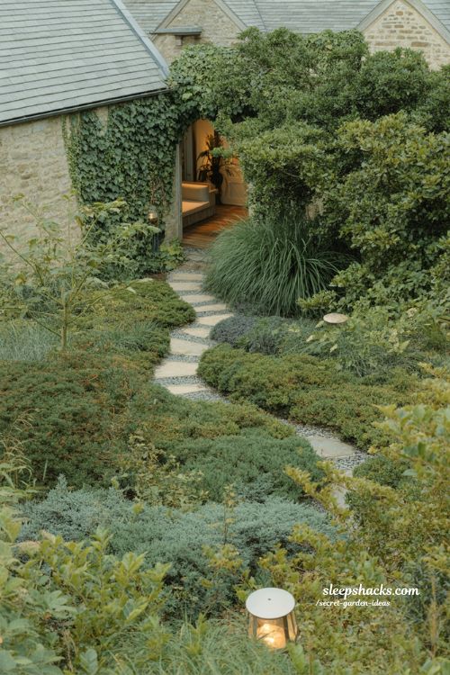 Secret garden ideas emotional hidden backyard design with curved path and layered plants 