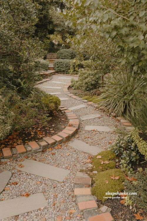 Secret garden ideas winding path design with gravel and stone stepping stones through lush backyard 