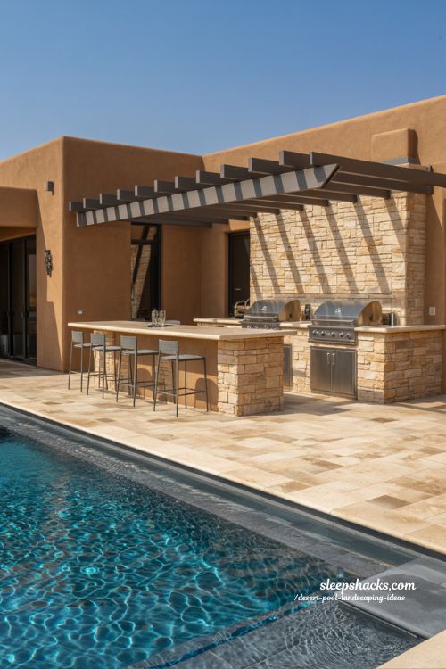 Shot type — Wide cinematic twilight architectural photography from pool deck level, slightly angled to capture both the reflective pool surface and adjacent fire pit zone in a single balanced frame Room description — A sophisticated desert backyard pool area where a modern fire pit is seamlessly integrated into the poolside landscape, positioned on a slightly raised stone platform surrounded by flagstone and decomposed granite, creating a dual experience of fire and water that feels intentionally designed for cool desert evenings where the pool reflects flickering flames against a calm open sky Style and era — Contemporary desert resort luxury with Scottsdale-inspired outdoor living design, blending minimalist hardscape geometry with warm atmospheric outdoor hospitality aesthetics Color palette — Deep midnight blue pool water, warm amber and orange fire glow, sandy beige flagstone, soft gray-brown desert stone, and muted desert twilight sky gradients shifting from indigo to dusky violet Key props and details — Built-in gas fire pit with clean architectural edges, low retaining stone wall integrating seating and fire feature, smooth flagstone paving transitioning into decomposed granite ground cover for heat resistance, subtle modern pool coping in neutral stone tones, minimal desert plant accents placed at safe distance, faint reflections of flames rippling across the pool surface, clean linear landscaping design maintaining openness and view corridors Lighting — Natural dusk fading into night with the fire pit as the primary light source, casting warm flickering illumination across surrounding stone and water, enhanced by soft ambient pool lighting beneath the surface creating layered reflections and depth Mood and atmosphere — Intimate, grounded, and atmospheric; soft warm fire tones that instantly shift the emotional tone of the space, cool dark water textures that amplify contrast, and a calm desert evening stillness that makes the environment feel timeless and deeply inviting Technical tail — no people, no text, no watermarks, no blur, no bokeh, all surfaces in sharp focus, photorealistic, 4K resolution, editorial interior photography, Pinterest-worthy