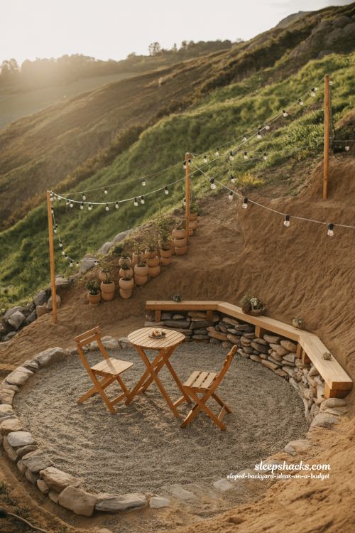 cozy hillside seating terrace ideas for sloped backyard with small bistro patio and retaining wall design