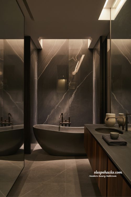 dark and moody modern luxury bathroom with black marble matte fixtures cinematic lighting and elegant spa aesthetic 