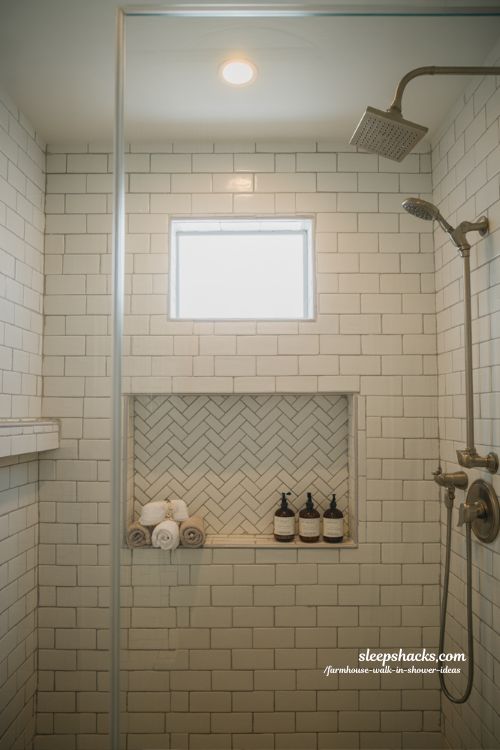 farmhouse walk in shower with built in tiled niche shelf and subway tile storage design idea