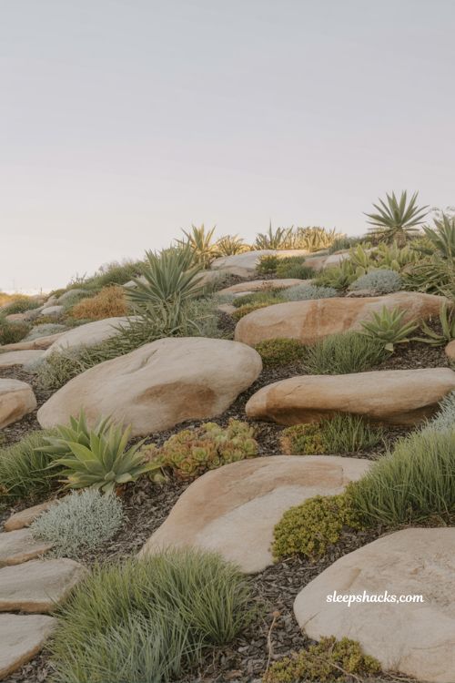 front yard landscaping ideas with boulder slope garden natural stone erosion control modern landscape design
