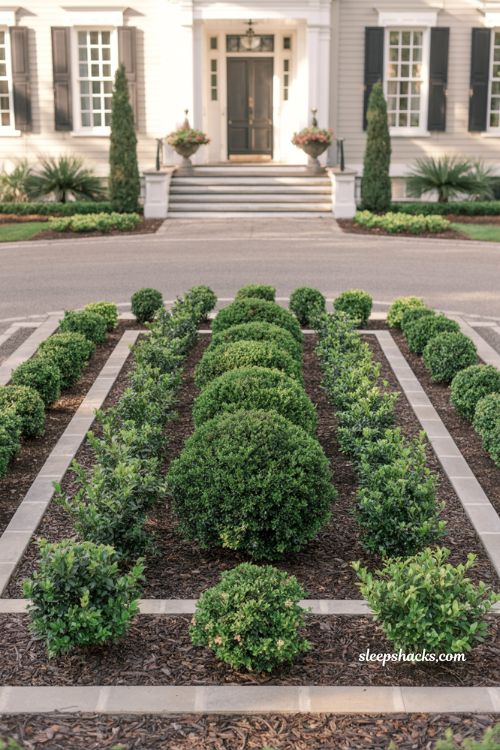 front yard landscaping ideas with symmetrical foundation planting framing front door classic curb appeal design