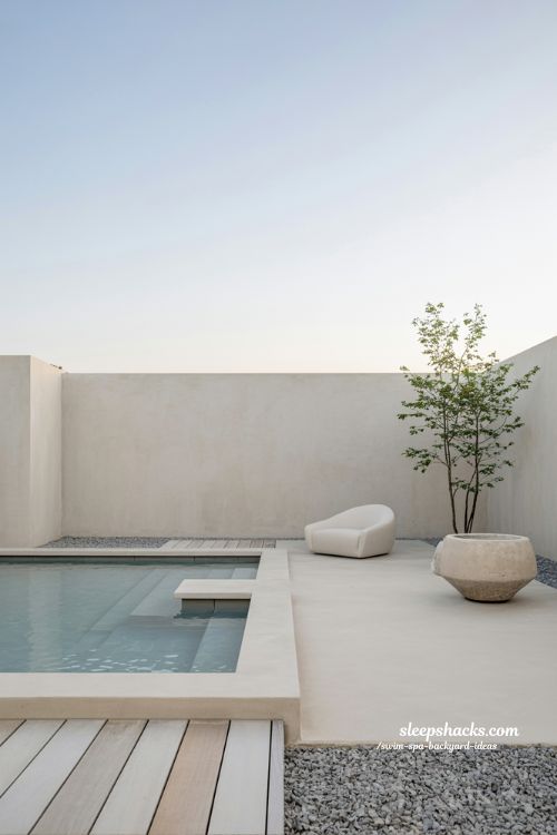 minimalist swim spa backyard design with clean lines and white concrete patio for a calm retreat