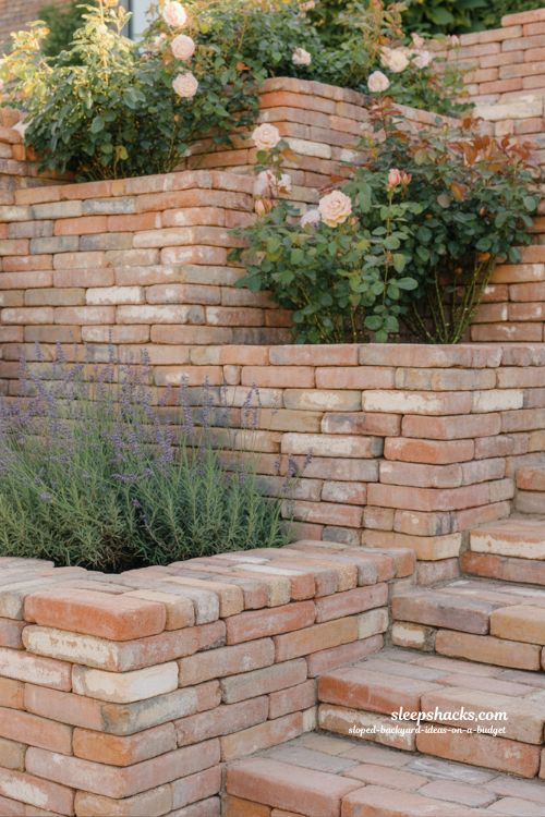 reclaimed brick terracing ideas for sloped backyard with vintage cottage garden landscaping and rustic charm