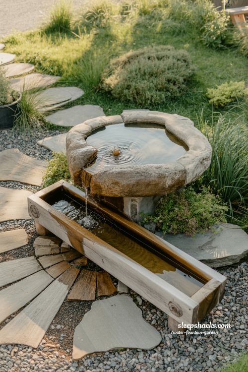rustic water fountain garden using natural wood and stone for timeless outdoor charm