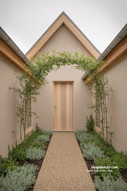 small front garden rock garden with succulents and gravel low maintenance drought tolerant landscape design 