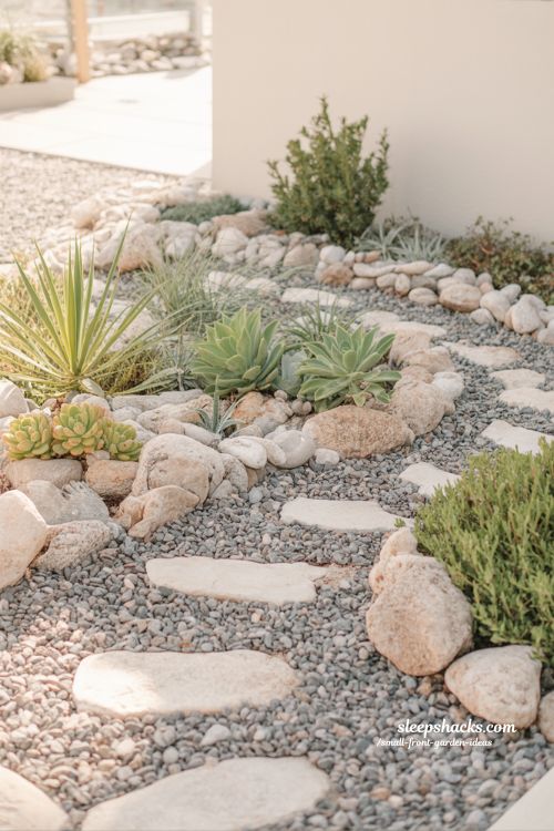 small front garden rock garden with succulents and gravel low maintenance drought tolerant landscape design 